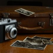 Photo of a vintage camera and photographs