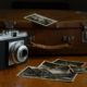 Photo of a vintage camera and photographs