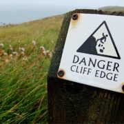 Photo of a sign warning 'Danger Cliff Edge'